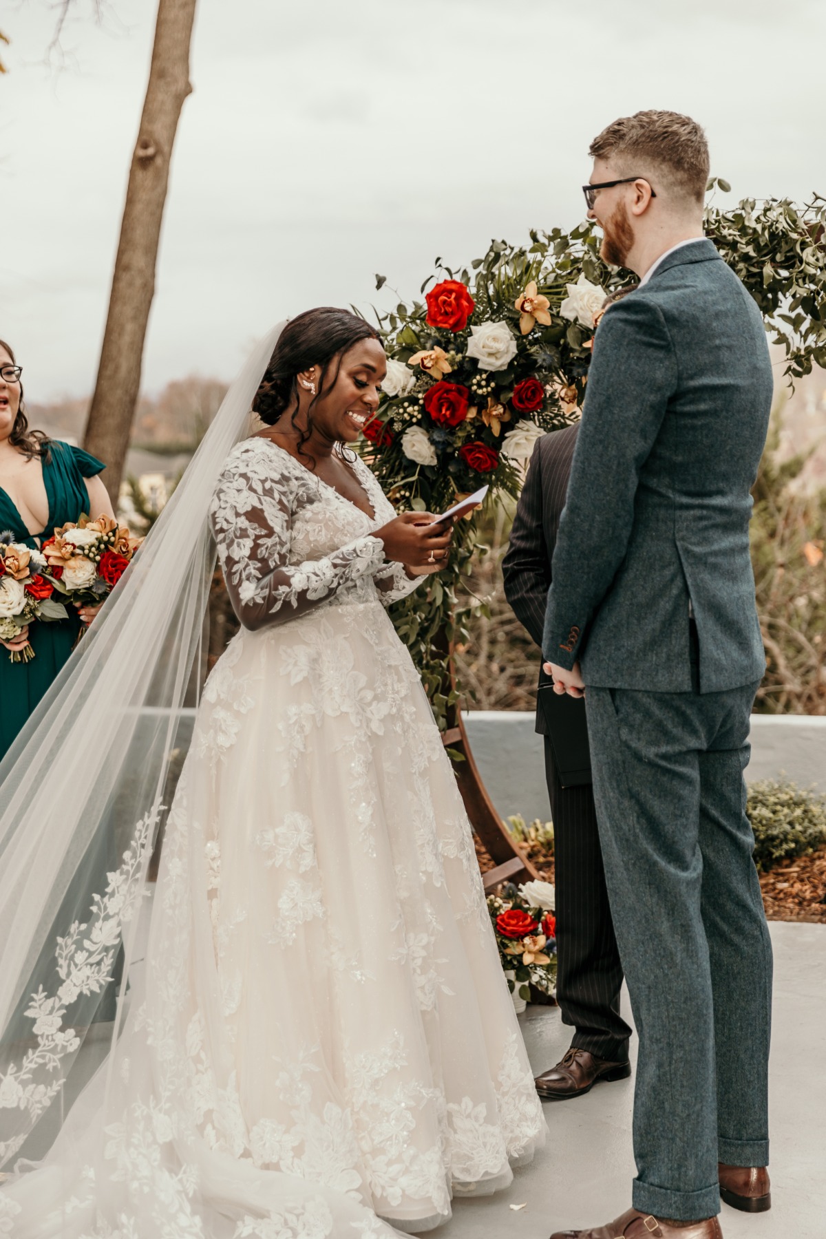 bride reading reading vows to her husband