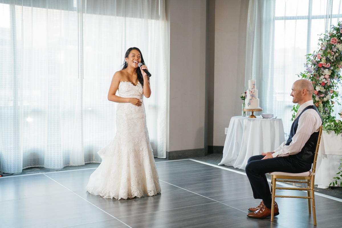 bride sang to groom at wedding