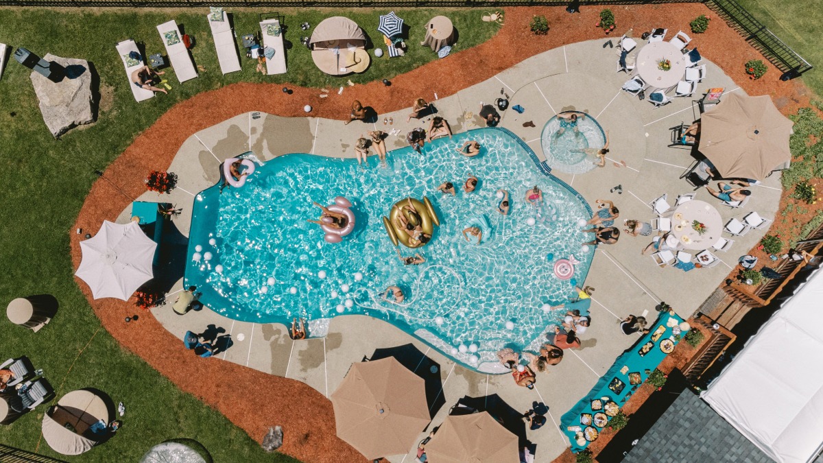 post wedding pool party drone POV