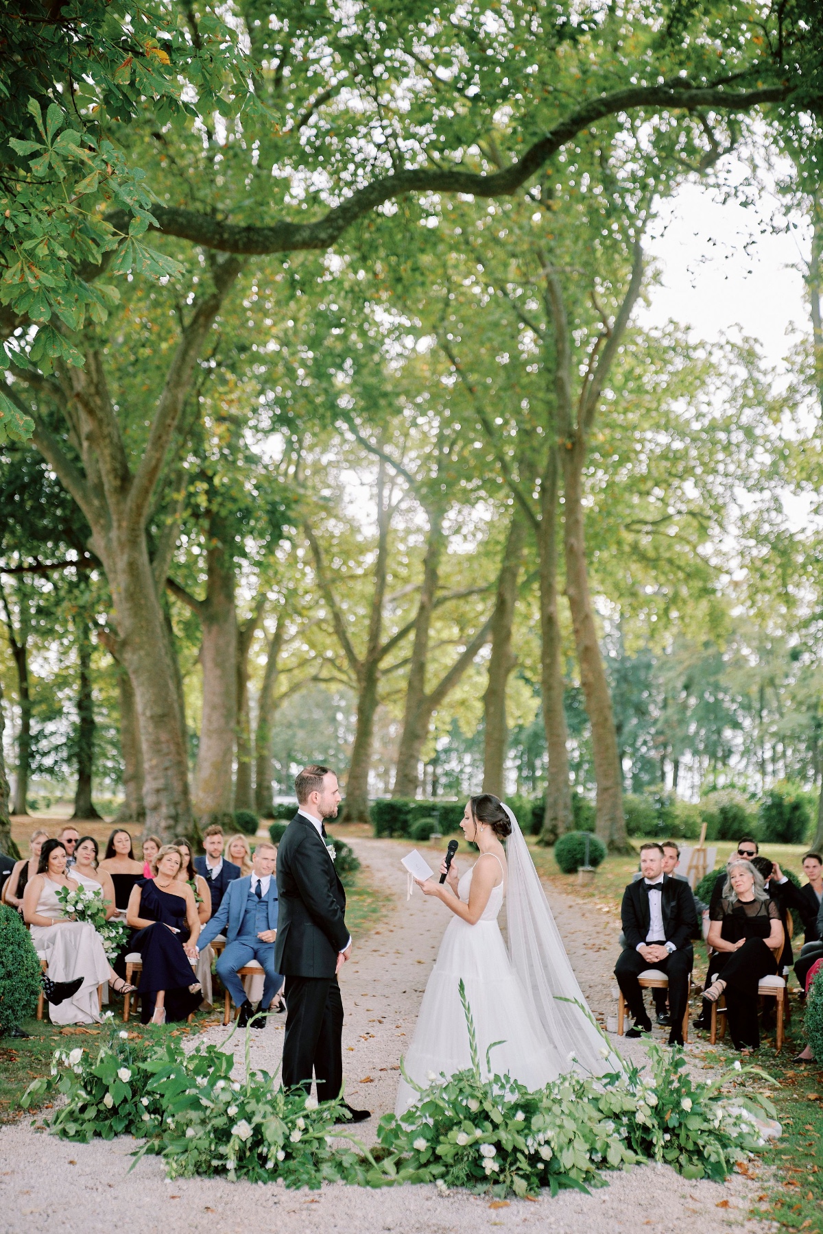 wedding altar greenery arrangements