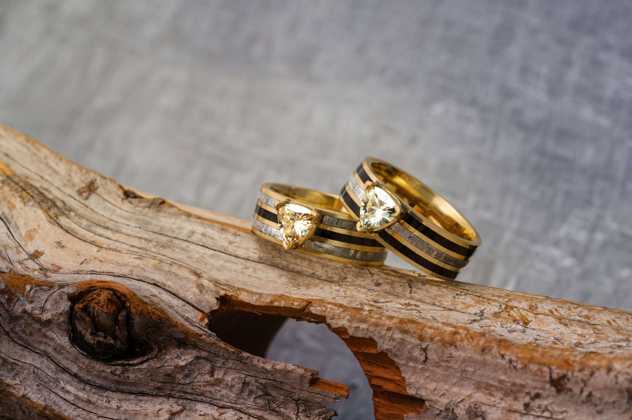 yellow gold, meteorite, and diamond wedding ring set by Jewelry by Johan