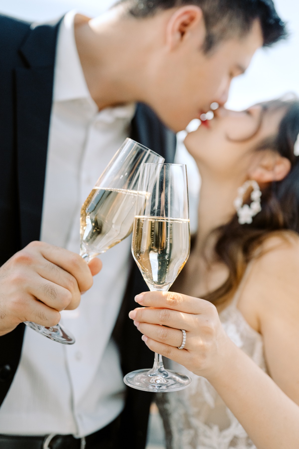 bride and groom toasting