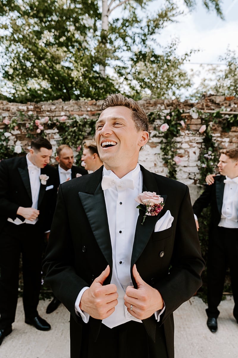 white tie groom and groomsmen