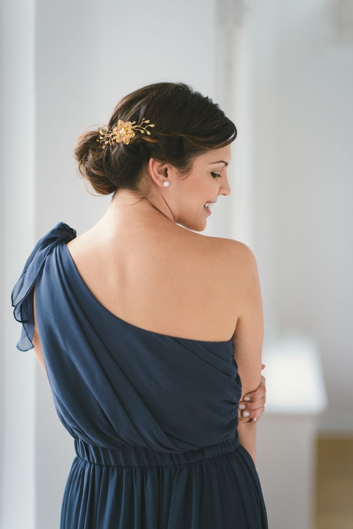 Bridesmaids hairstyles blue dress with bare shoulder hair jewelry like Golden flower