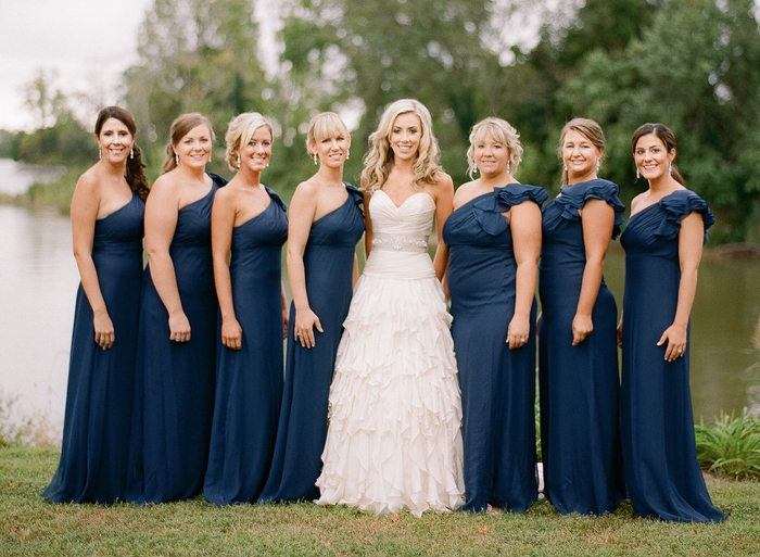 seven wedding bridesmaids with blue dresses the bride, all with different hairstyles, hairstyle bridesmaid