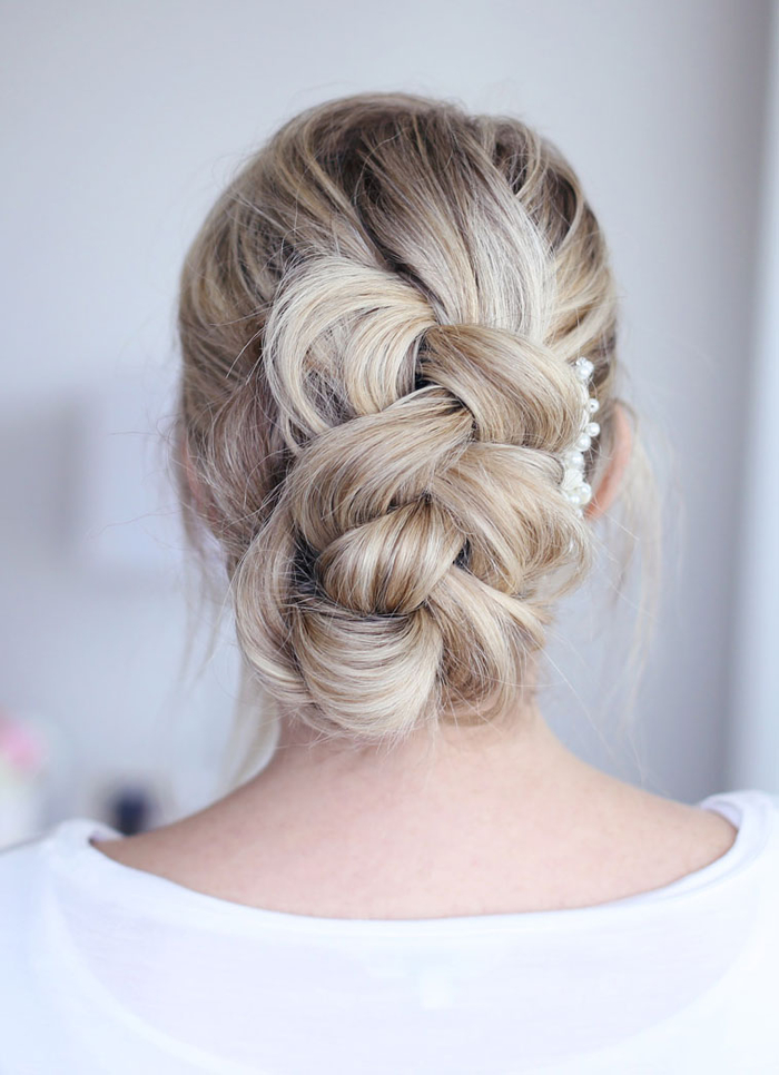 blond hair, braided hair, pieces of jewelry from beads perfect wedding hair