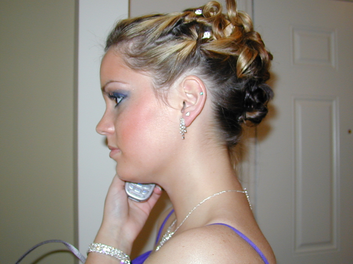 Ombre hair in an intricate updo with cornrows and beads