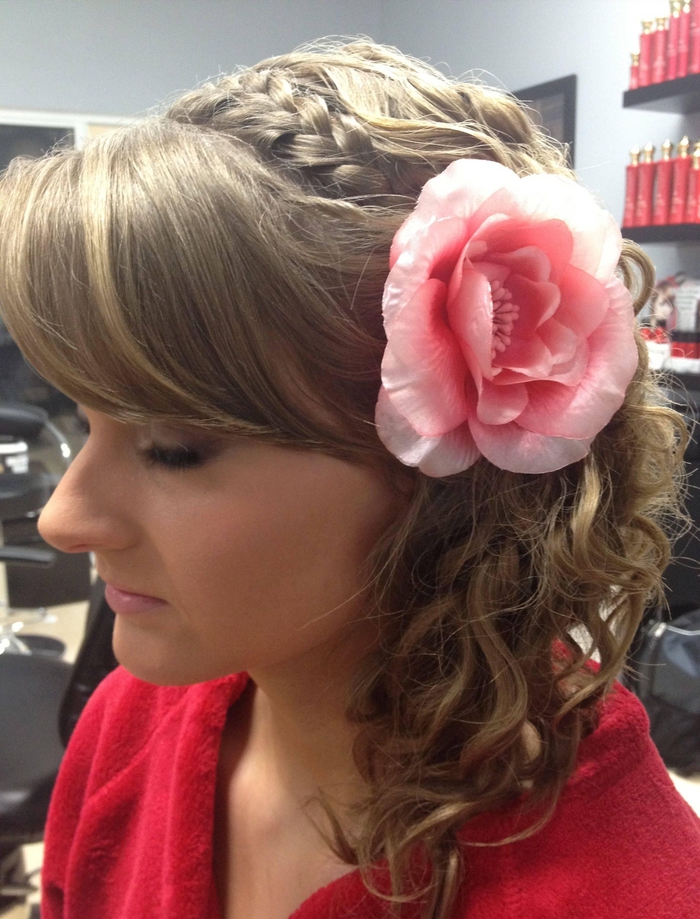 intricate wedding hairstyle from some parts of the Pony, braid and Curls beautiful flower