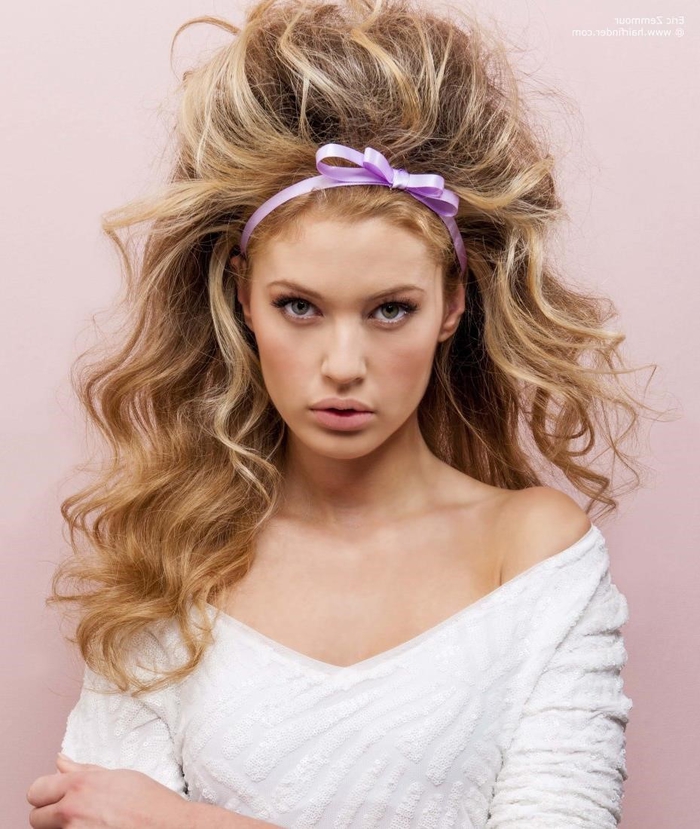 big wild hair with an adorable purple ribbon Blonde hair with strands wedding hair