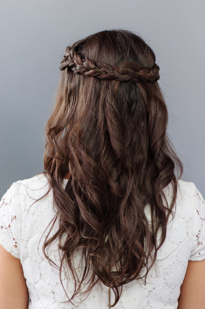 long brown hair in a braid as a wreath on white dress easy-to-make wedding hairstyle