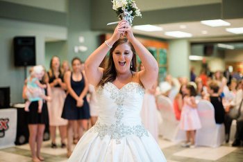 Bride-to-be bouquet toss differently