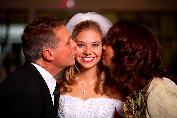 Father-daughter-dance of the bride and parents wedding portrait