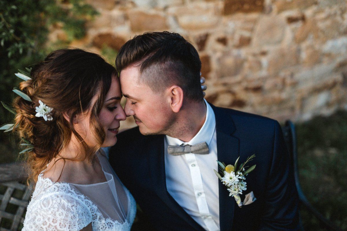 Wedding couple hugging in love at the wedding day