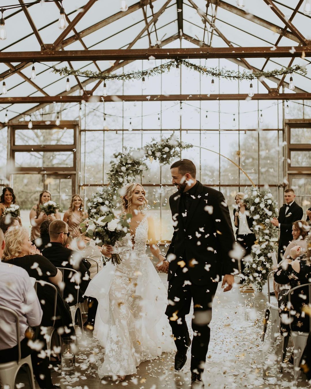 glass greenhouse wedding venue in the midwest