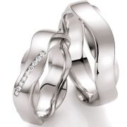 Beautiful curved wedding bands white gold with either brilliant history