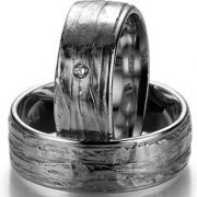 Wide wedding rings in white gold with either a brilliant