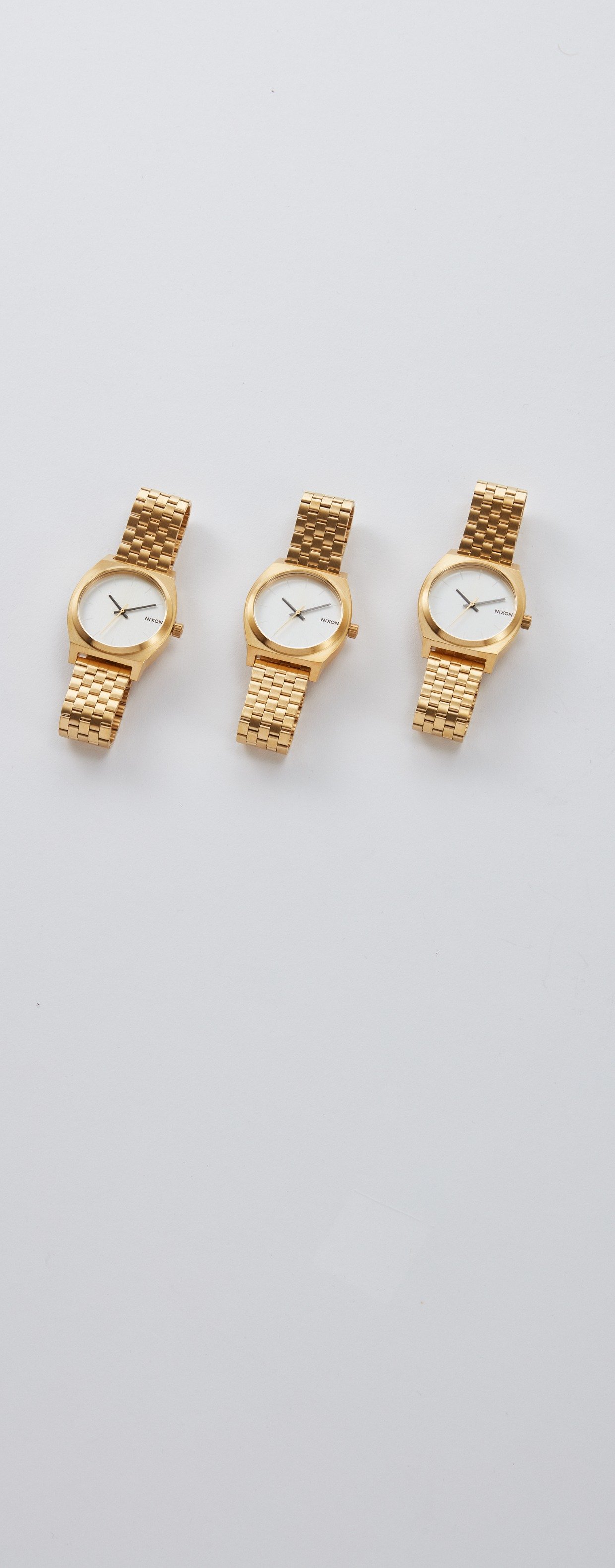 affordable gold watches for groomsmen by Nixon