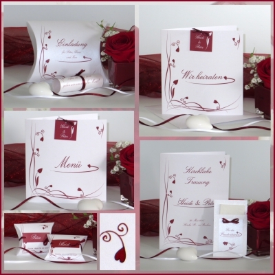 Wedding cards with elegant red ornaments and heart.