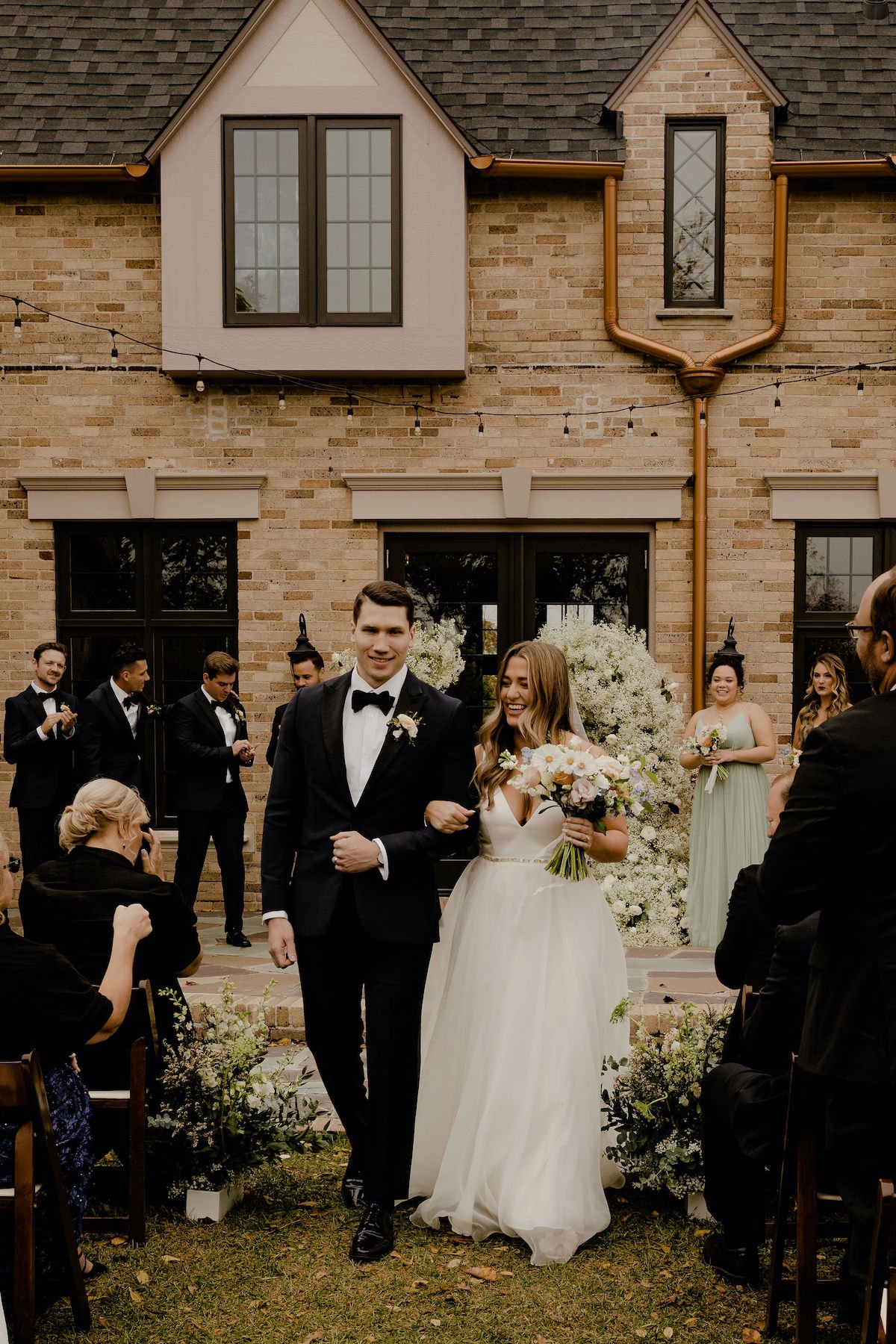 small flower planters for ceremony aisle