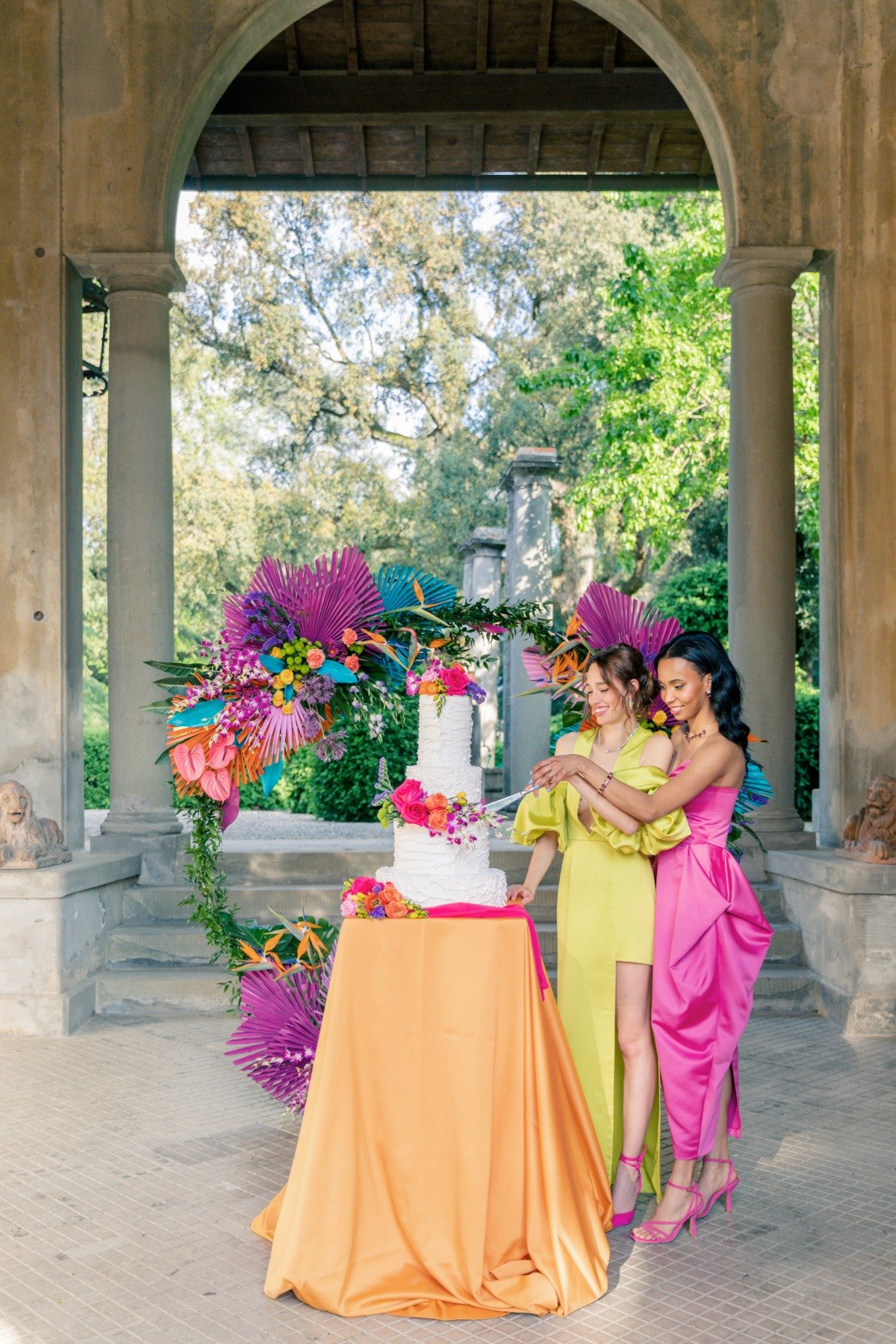 This colorful Tuscan elopement featured giant hand-crafted flowers