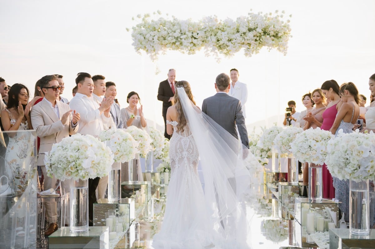 Bride walking down the aisle at Thailand ceremony