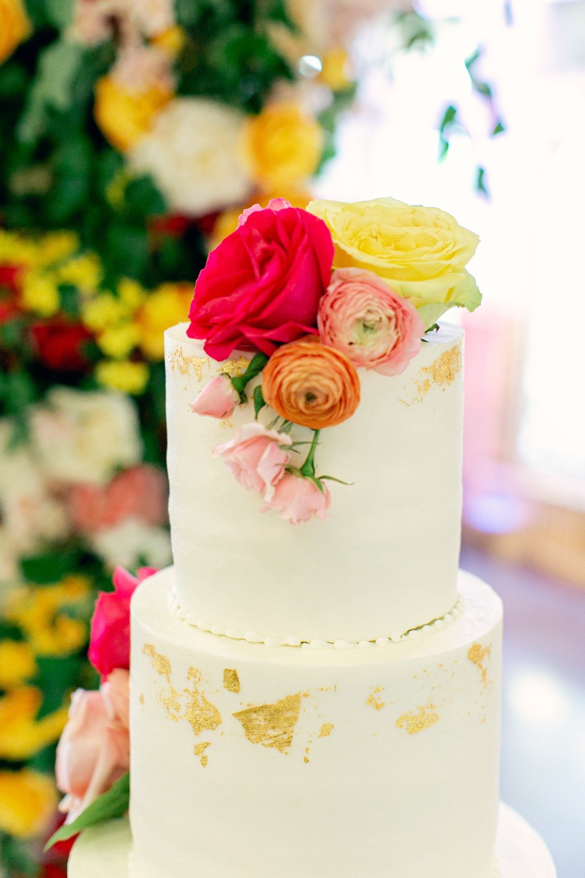 wedding cake with colorful flowers