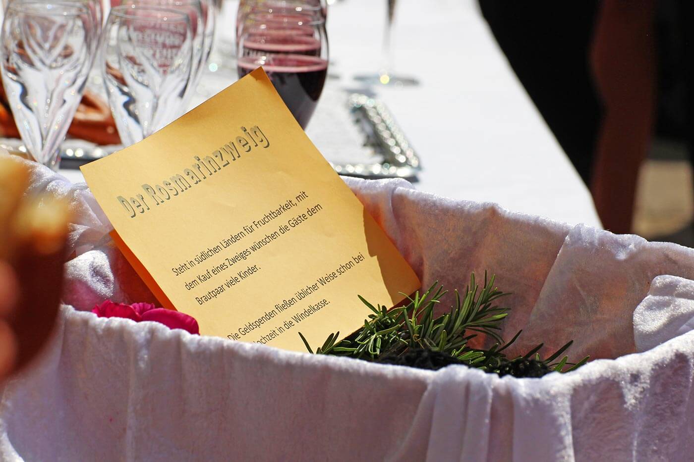 Sprig of rosemary wedding boutonniere for the guests