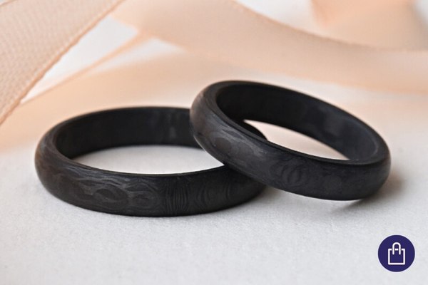 Half-round wedding rings made of Carbon