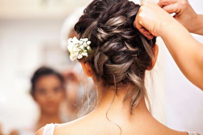 Beautiful wedding hairstyle with flower accessory