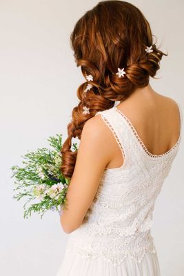 The Side-Swept wedding hairstyle is very elegant