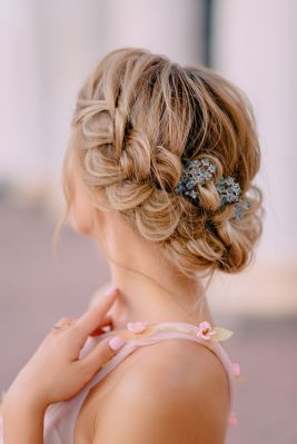 Beautiful braided hairstyle with blue hair accessories