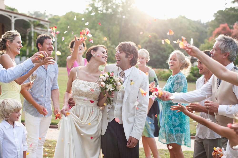 Wedding couple celebrating with guests, cover picture for FB, the Original drive