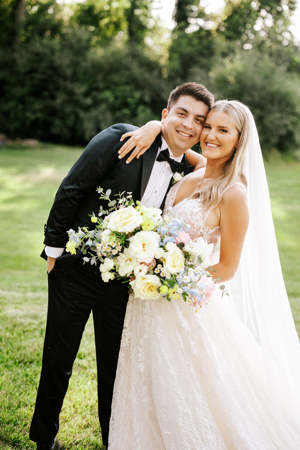 Enzoani bride with classic groom 