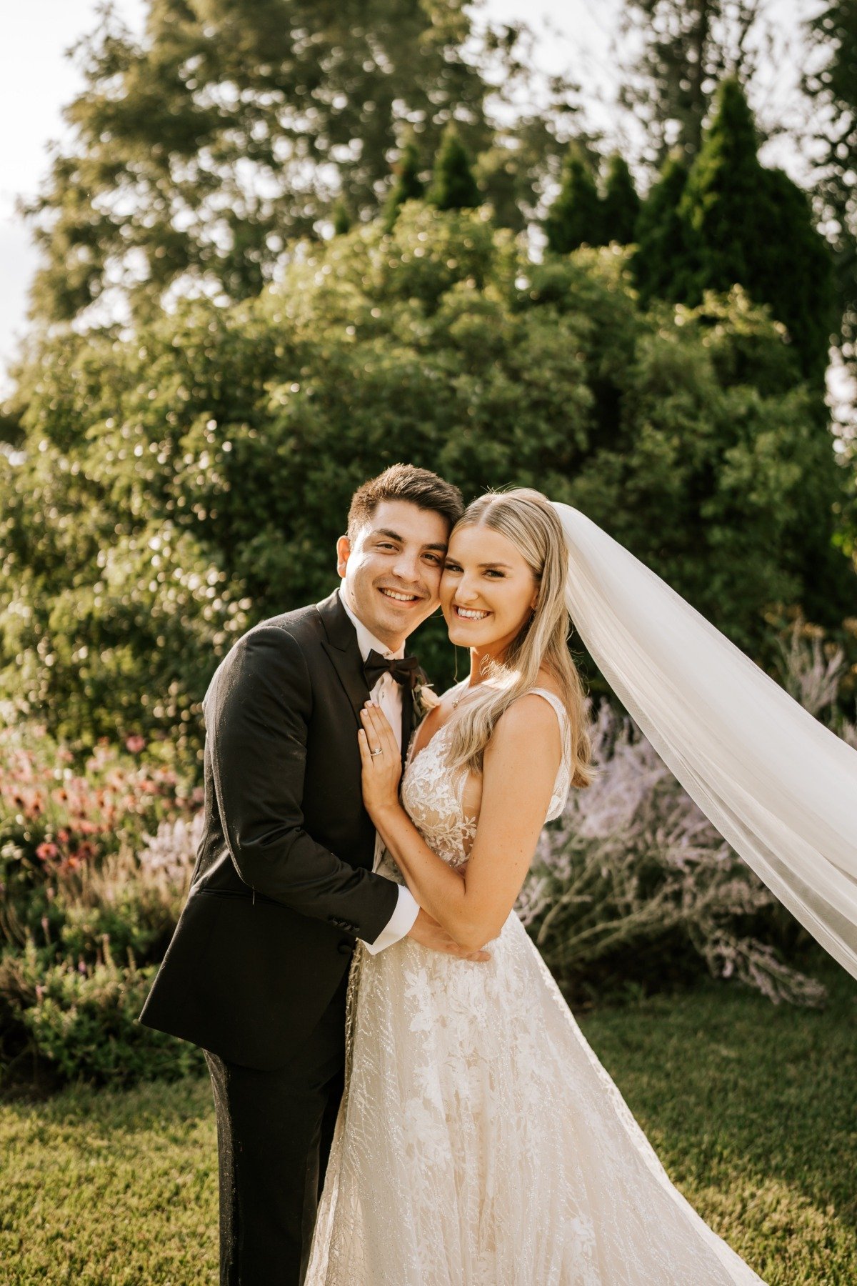 Chic bride and groom at garden wedding 