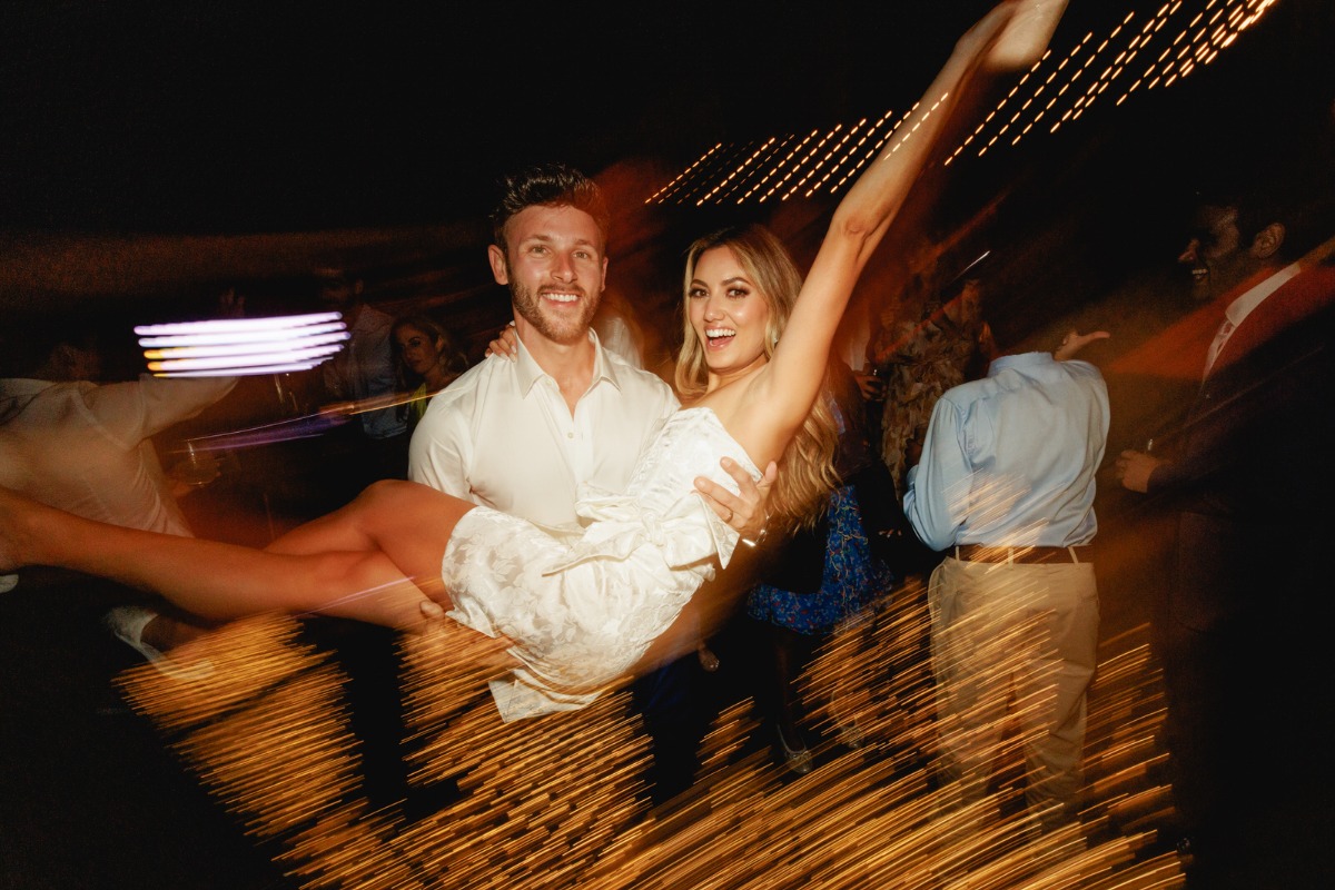 Bride and groom on light up dance floor 