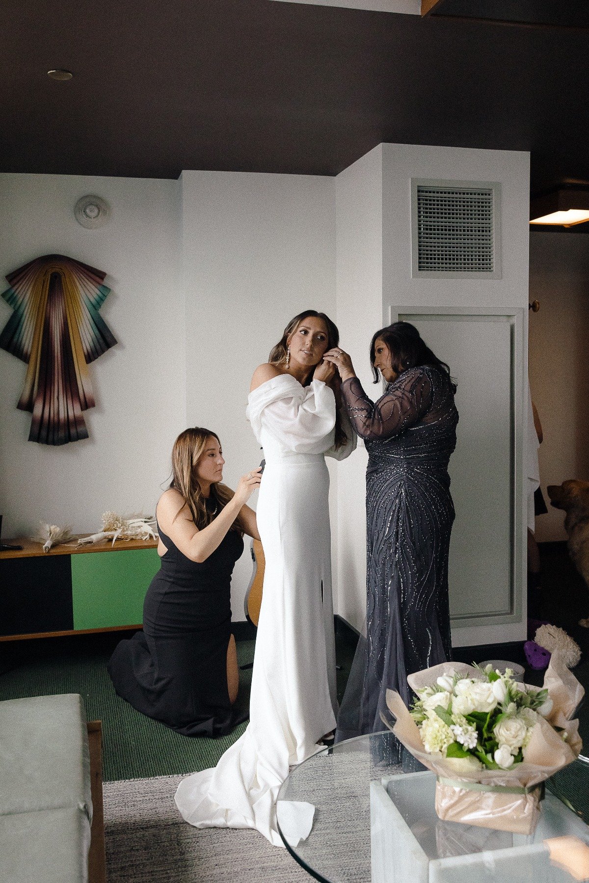 Modern bride getting dressed at Ace Hotel 