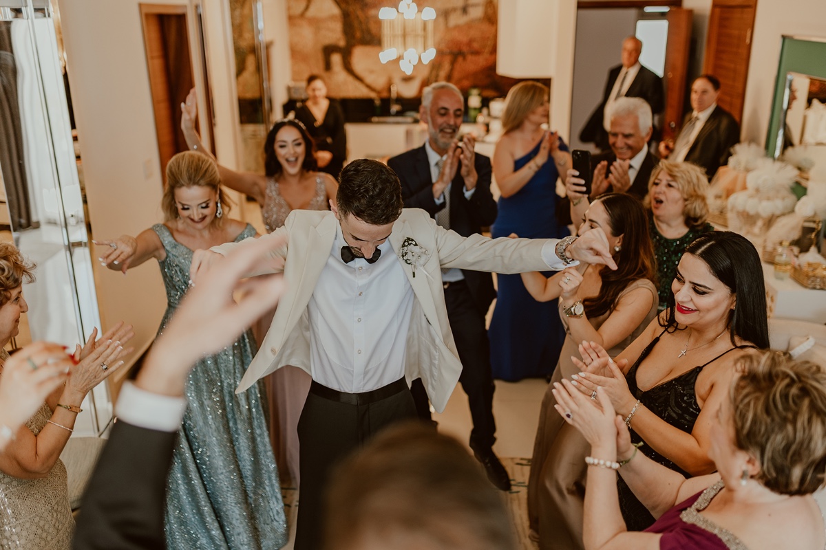 Armenian groom dancing to his bride 