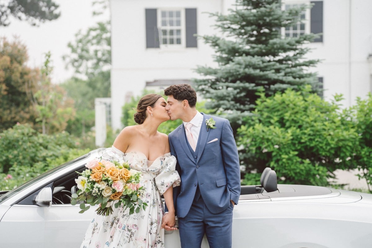 Couple kissing at Harding Waterfront Estate