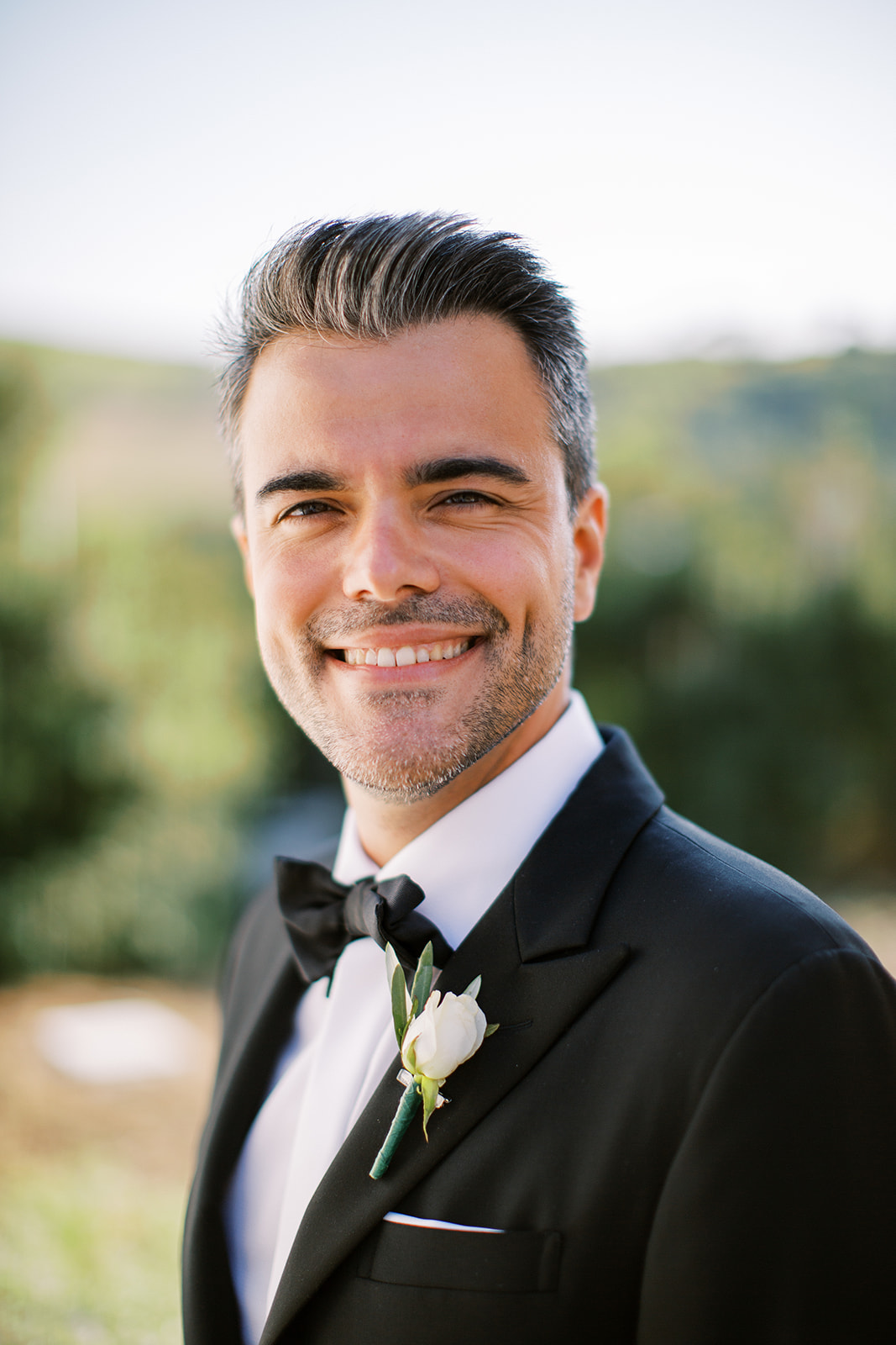 classic white rose boutonniere 