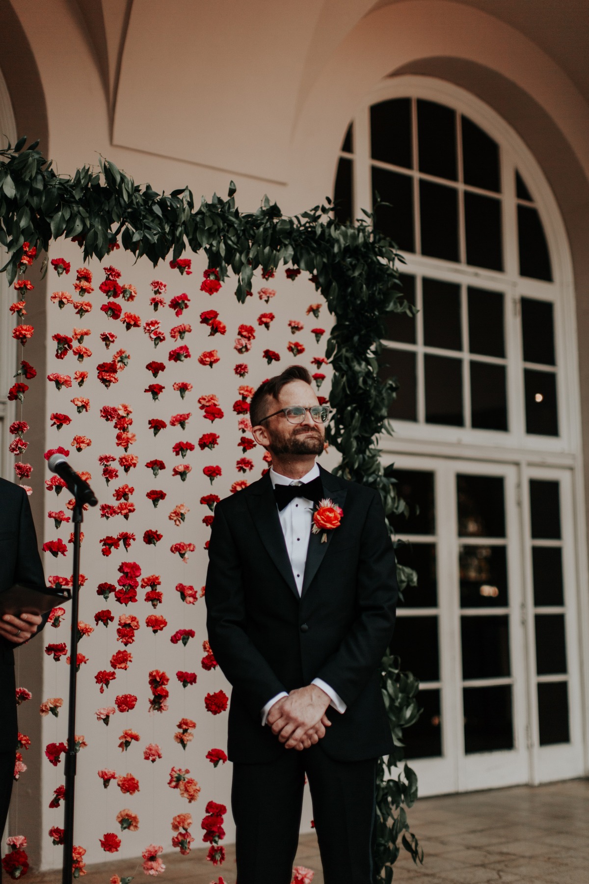 Groom seeing bride walk down aisle 