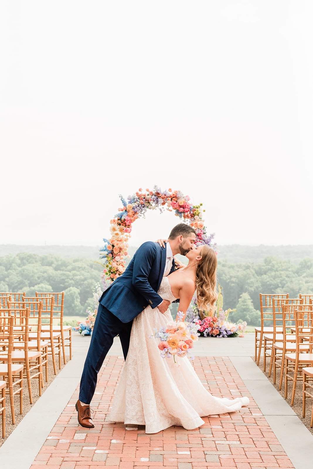 whimsical rainbow floral arch