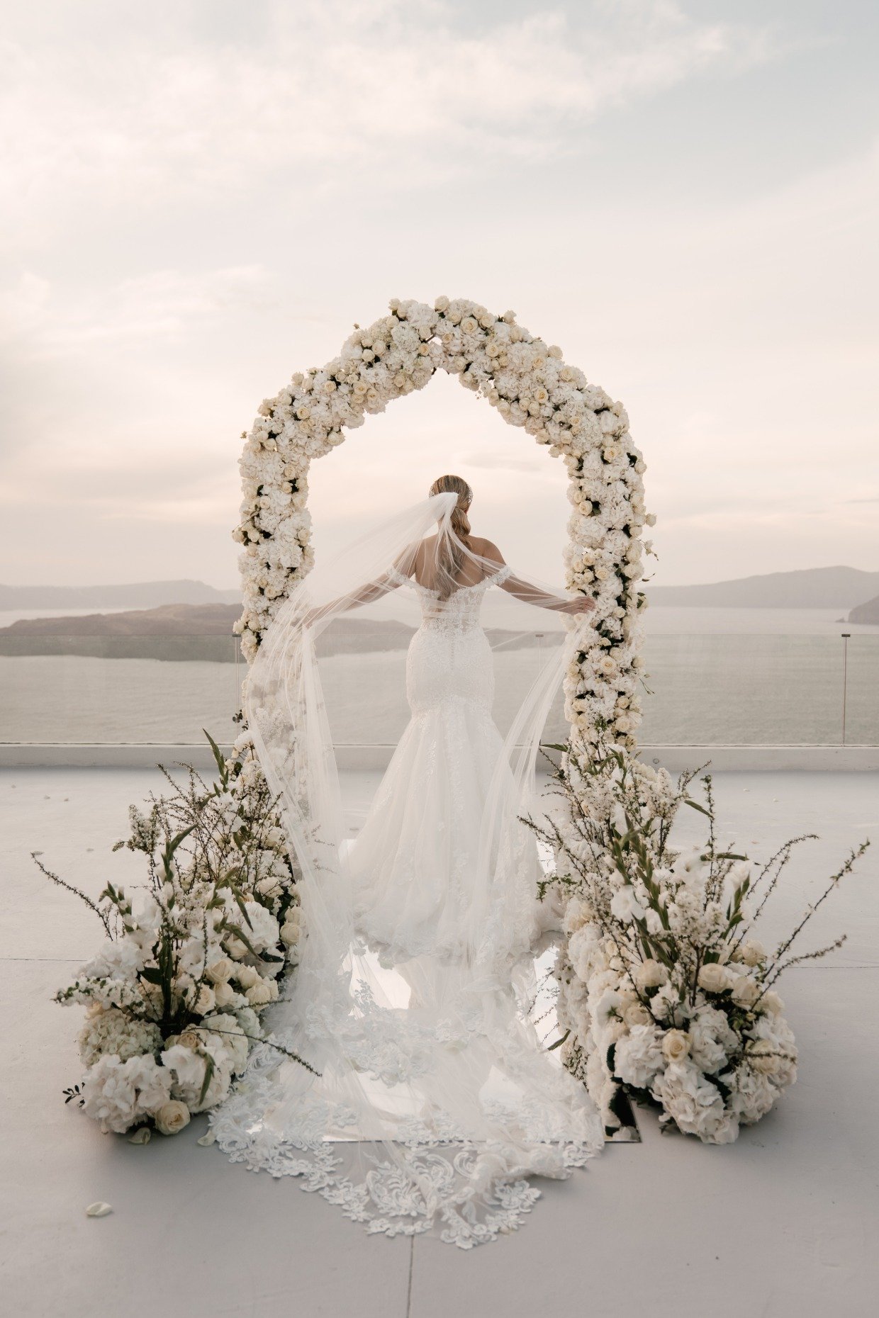 floral arch bridal portraits