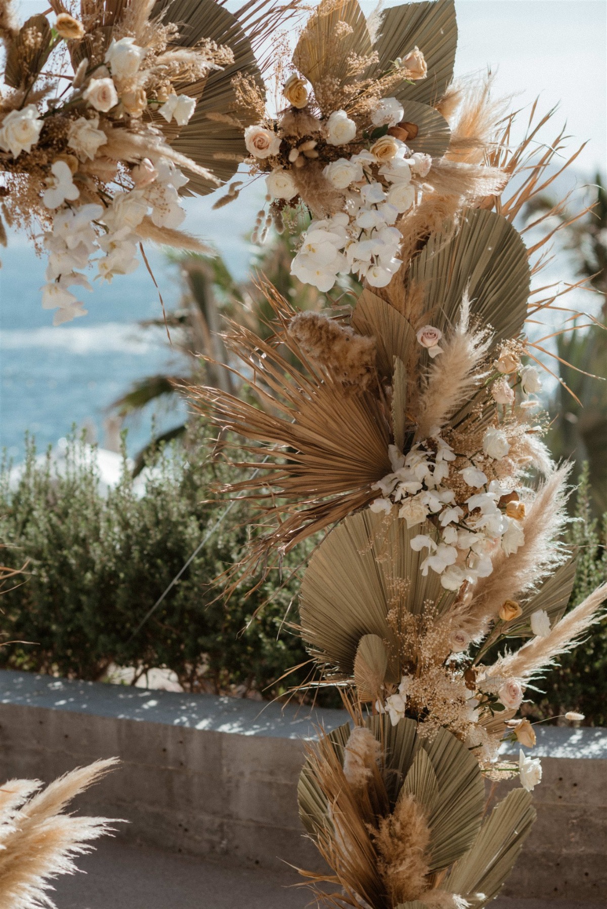 dried floral arch for tropical wedding ceremony