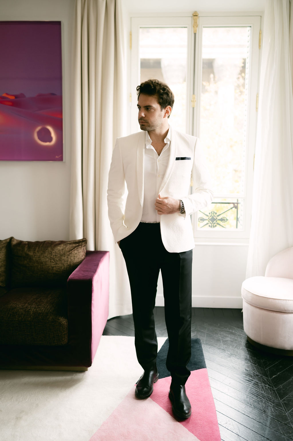 Parisian groom in vintage white suit 