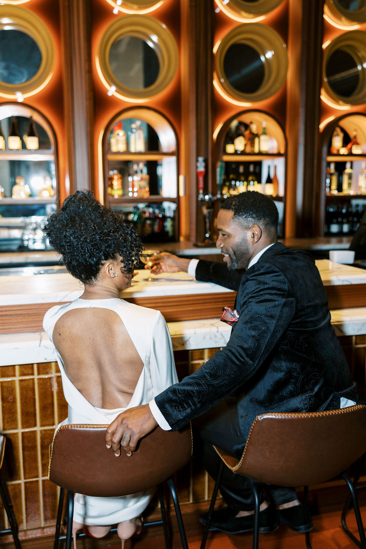 Bride and groom drinking NYC craft cocktails