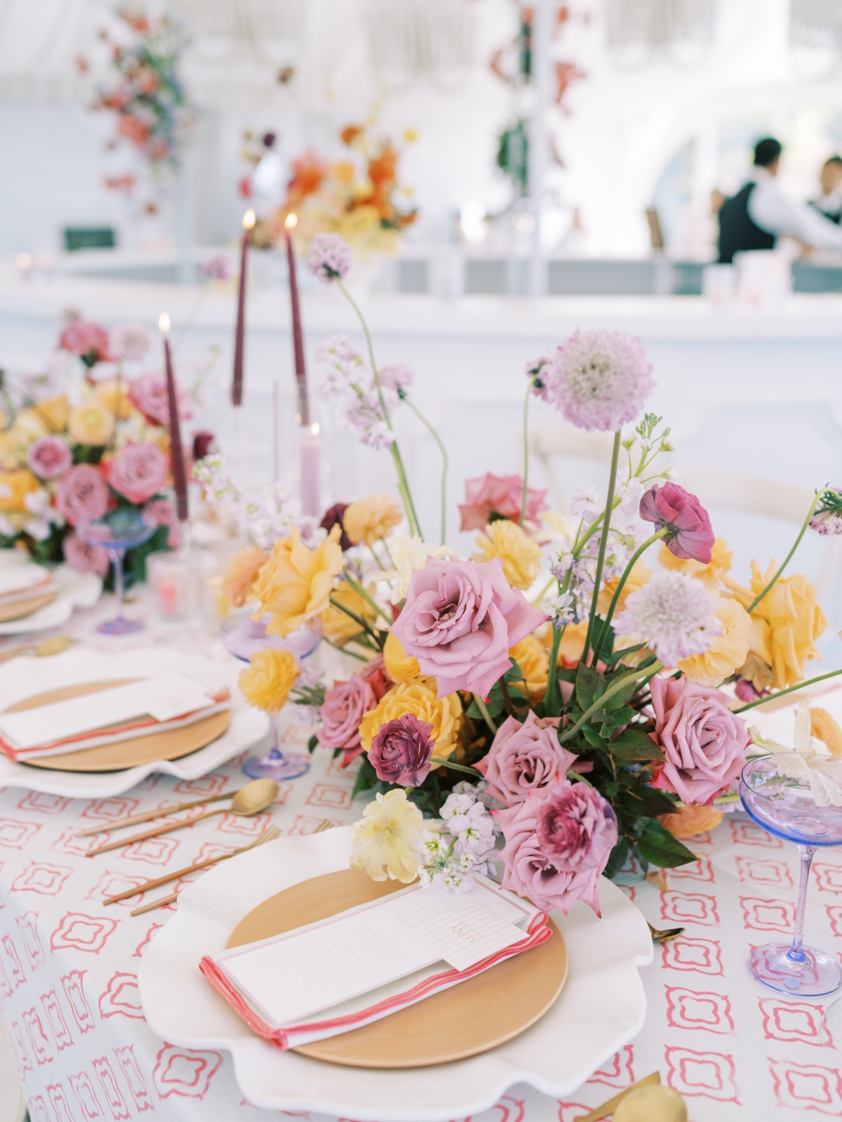 purple and yellow rose centerpiece