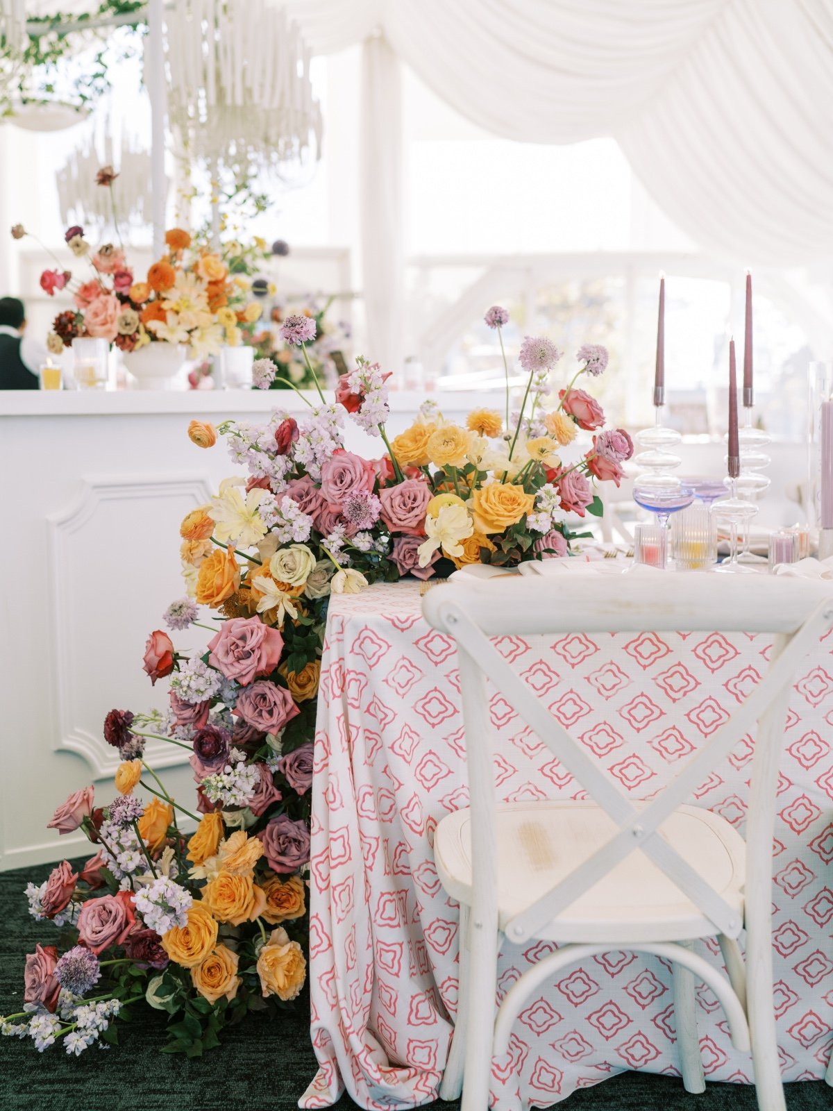 rainbow colored roses centerpiece