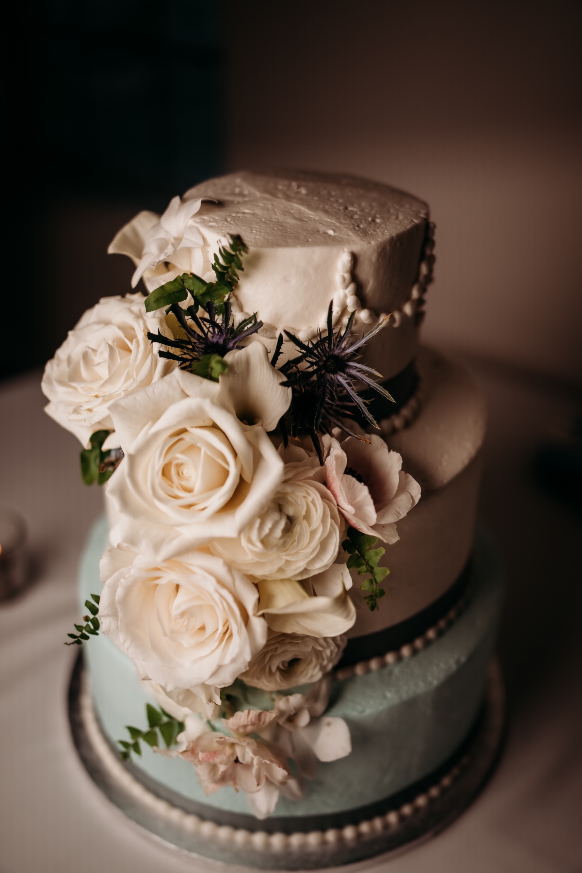 white wedding cake with florals