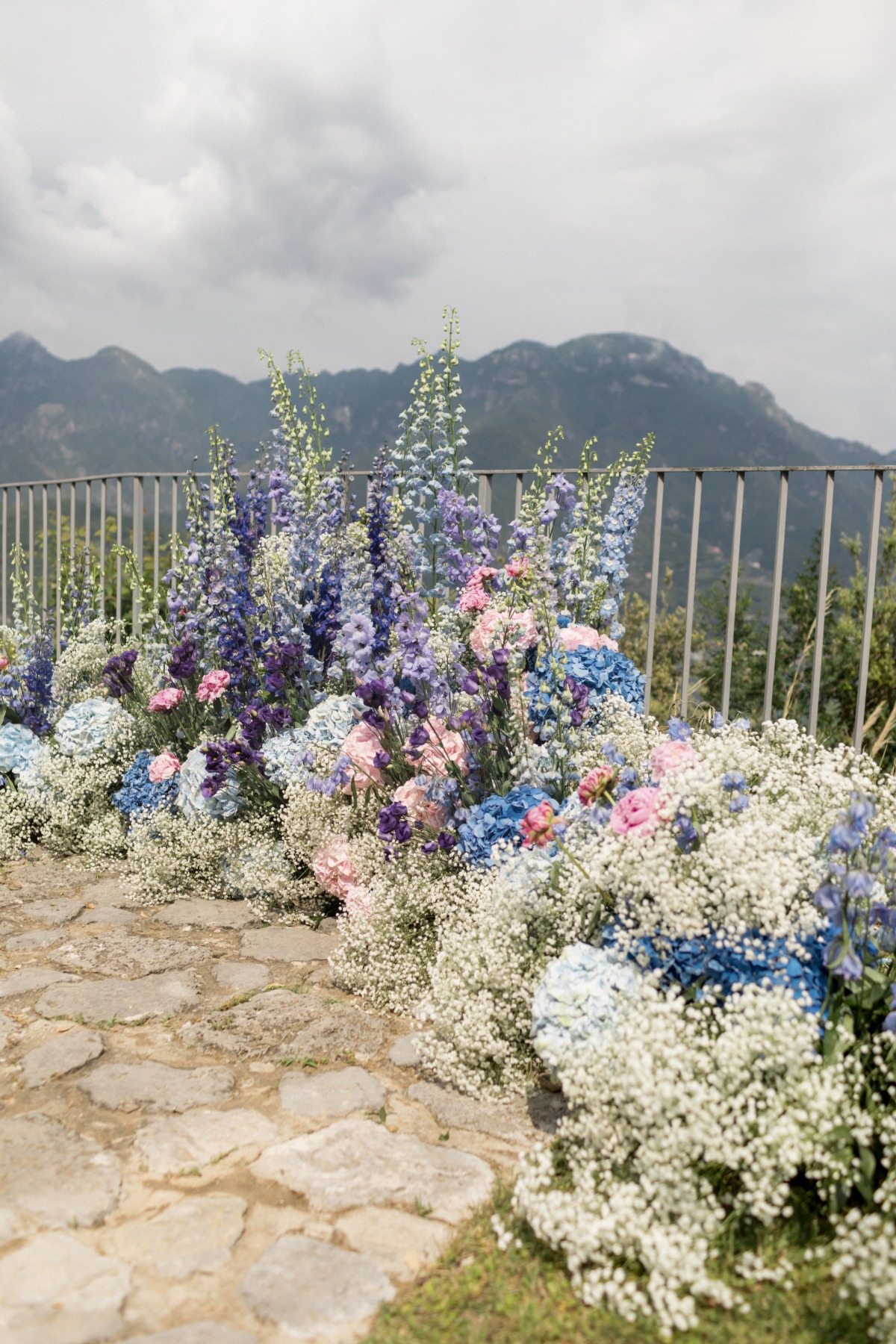 blue and purple floral installation with pops of pink