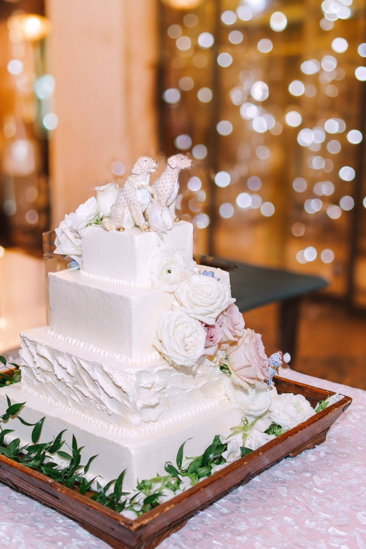 wedding cake with dog cake topper